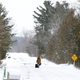 A man walks down a road in Champlain, New York, toward the U.S.-Canada border, Feb. 13. (Reuters/Christinne Muschi)